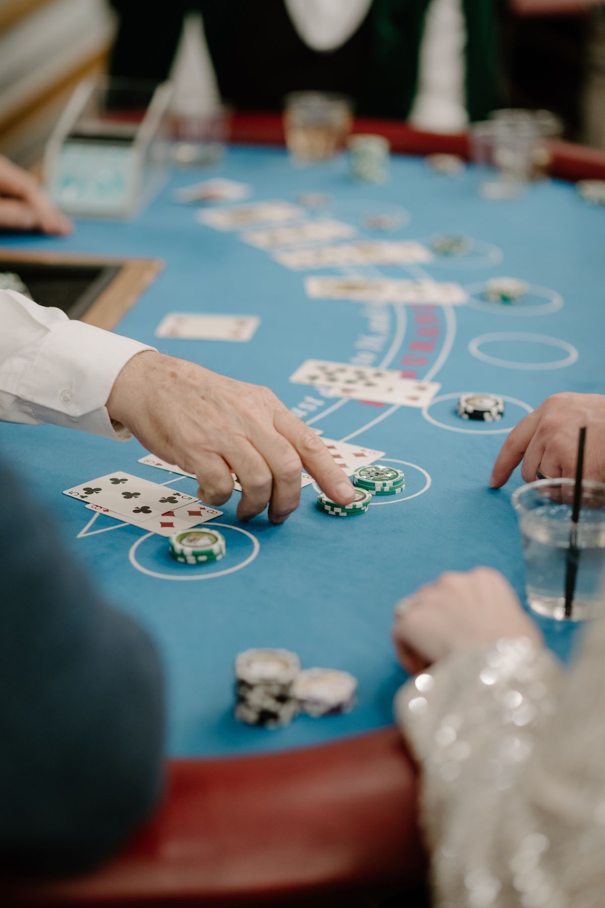 Casino chips and cards on the blackjack table