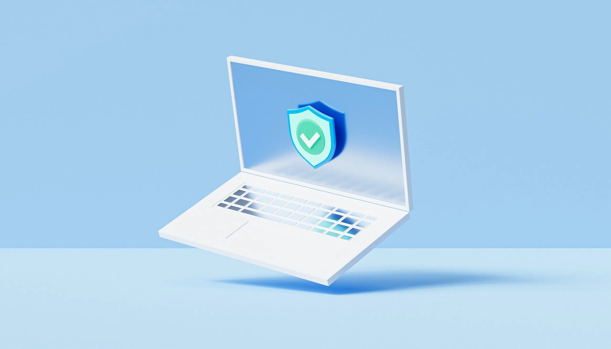 laptop with green symbol depicting cybersecurity