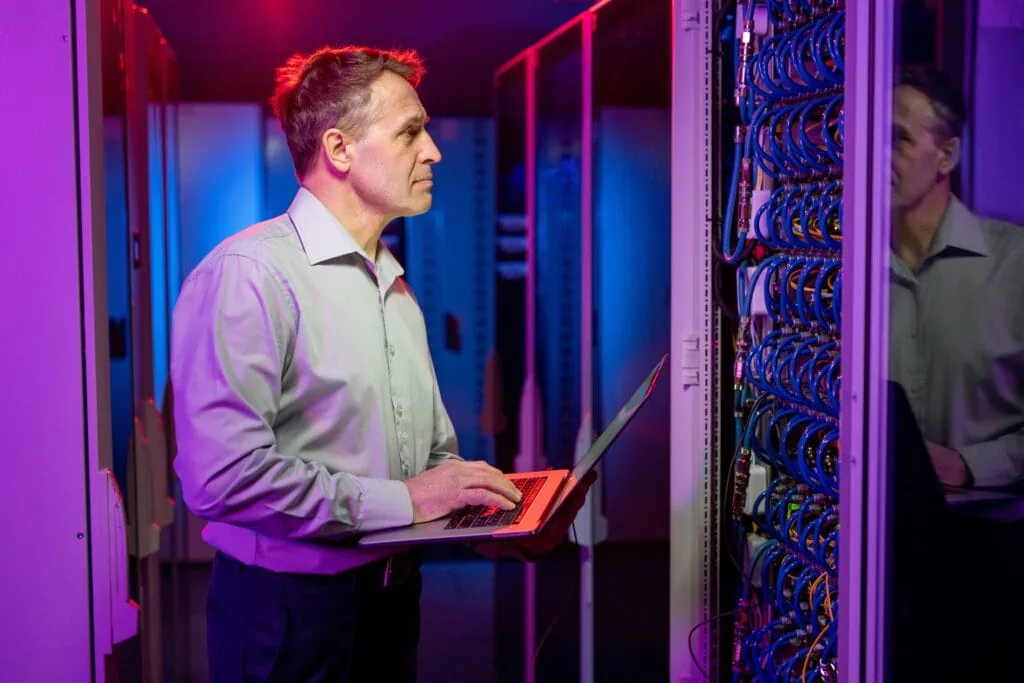 man checking on server for cloud security