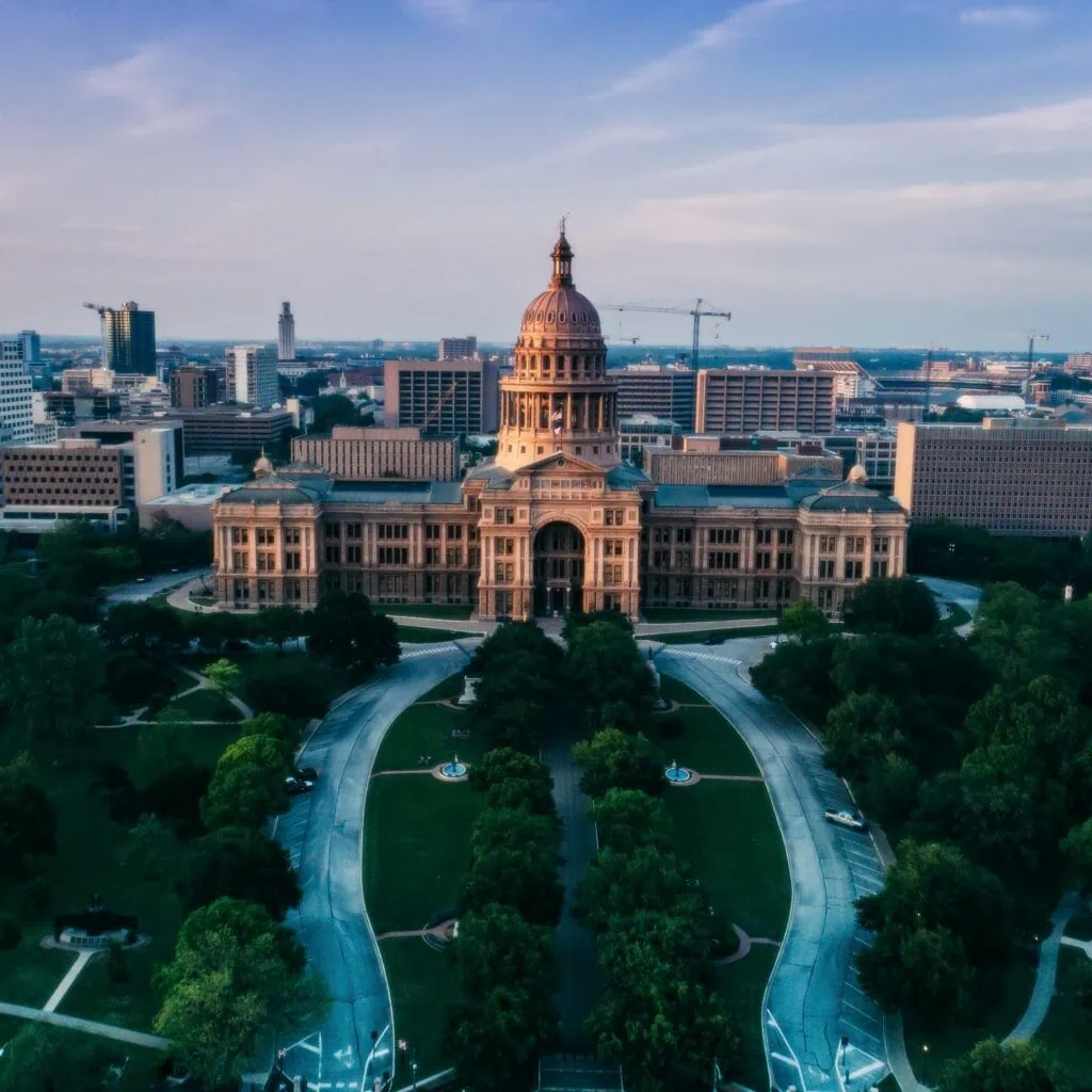 An aerial view of the capitol building in Austin, Texas with IT services.