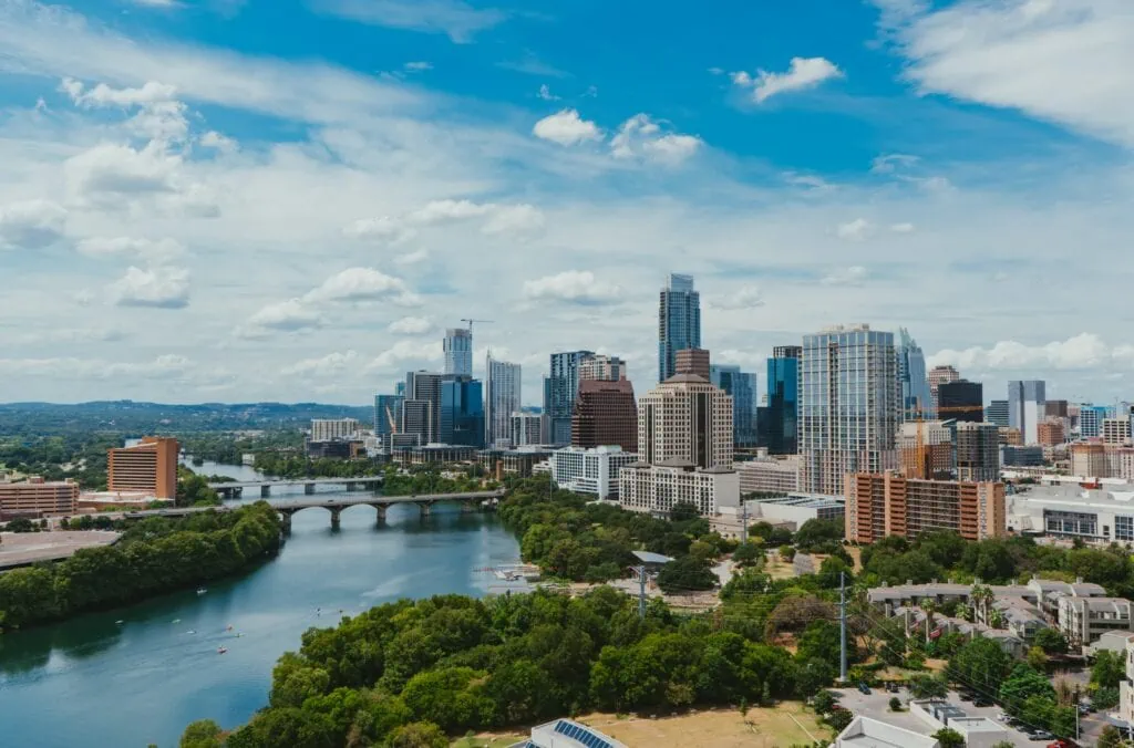An aerial view of the city of Austin showcasing its IT services businesses.
