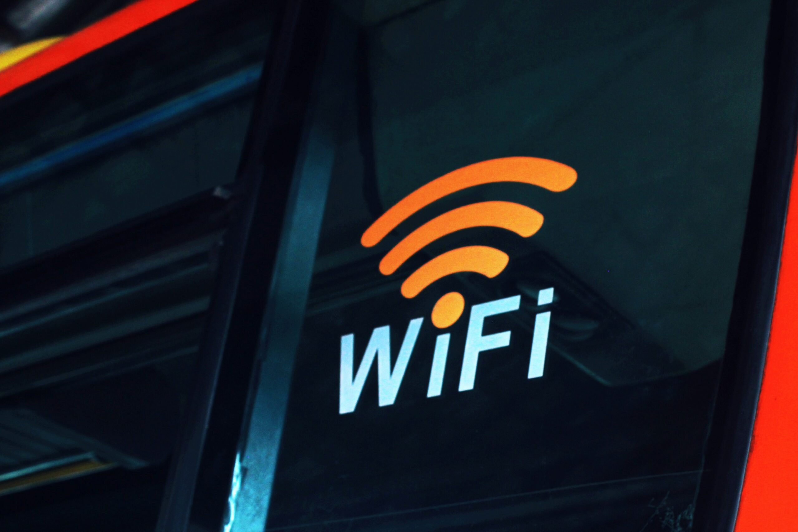 A Wi-Fi logo connecting to a PC displayed on a window.