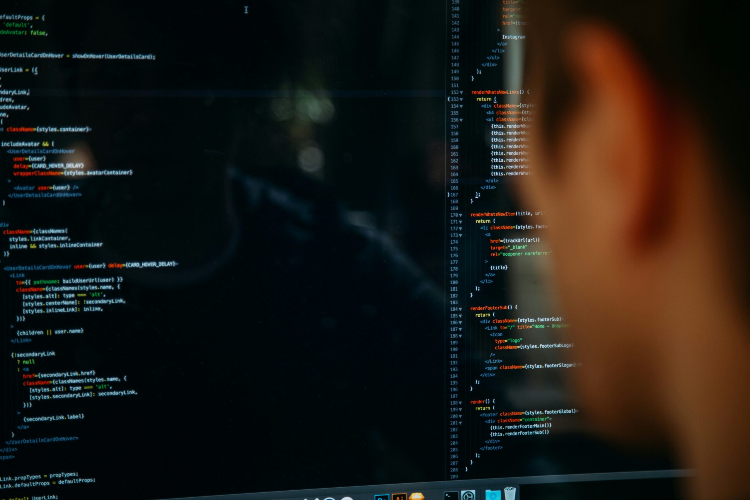 A person looking at a computer screen displaying lines of code, with a focus on the text and a blurred profile of the IT consultant.